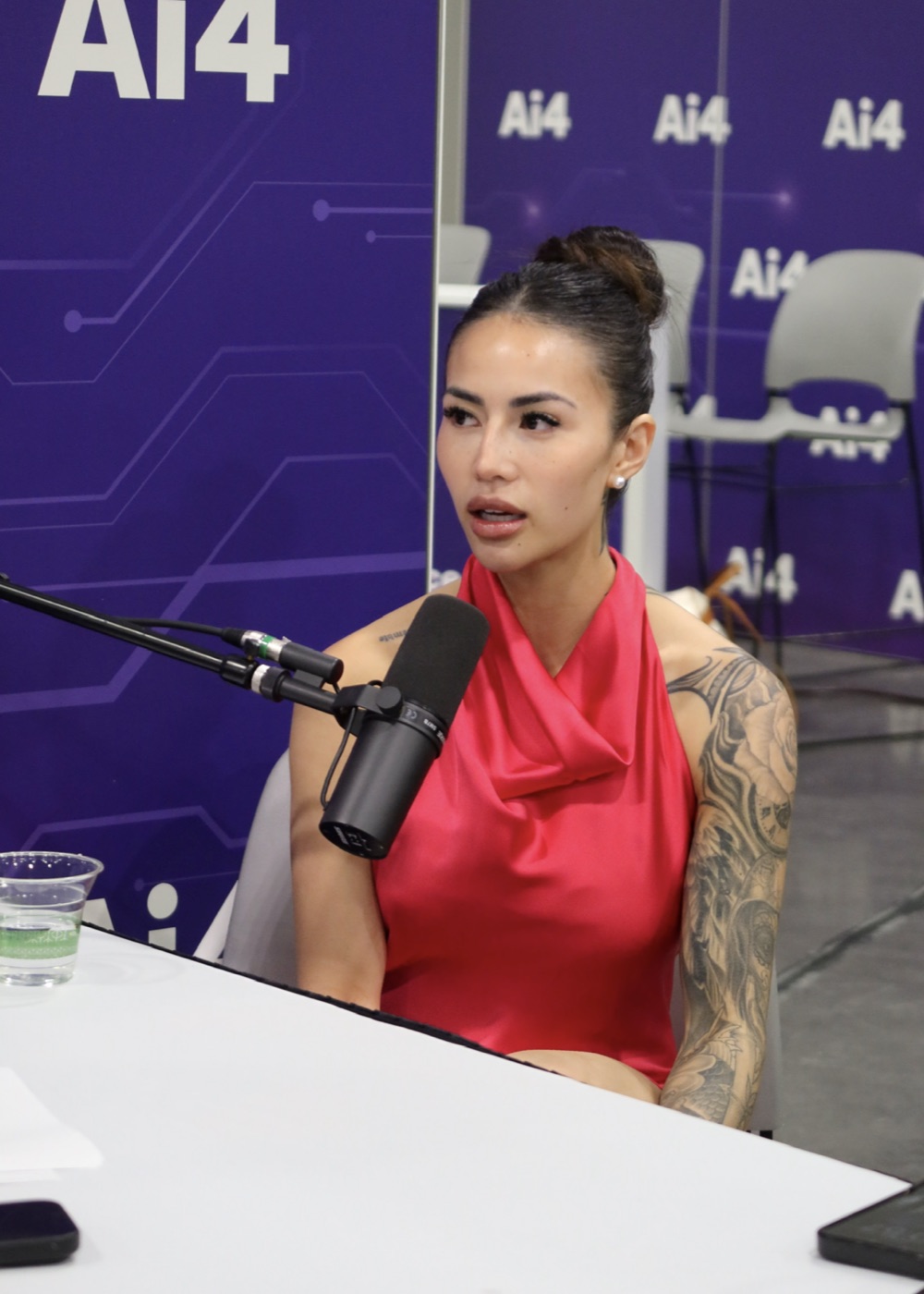 Katriona Aromin speaking on a podcast
